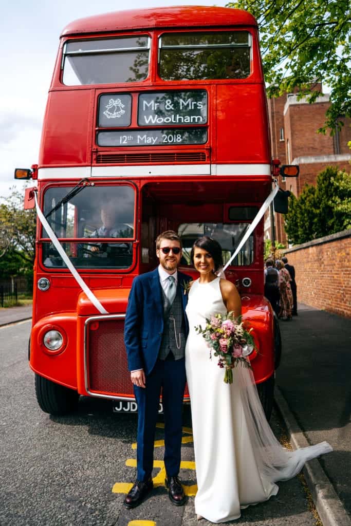 wedding couple and red bus
