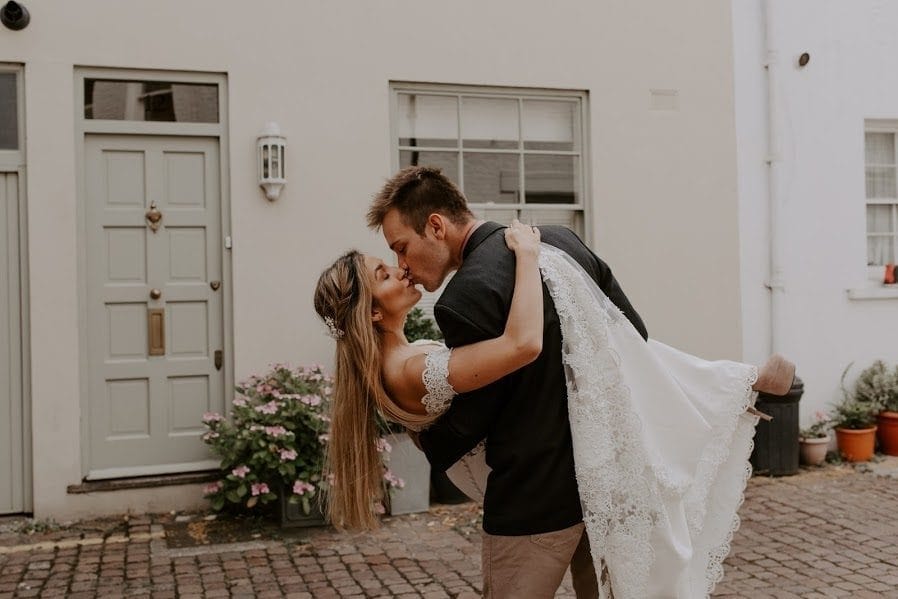 wedding couples kiss