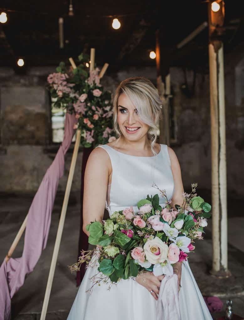 bride and tipi for old warehouse wedding