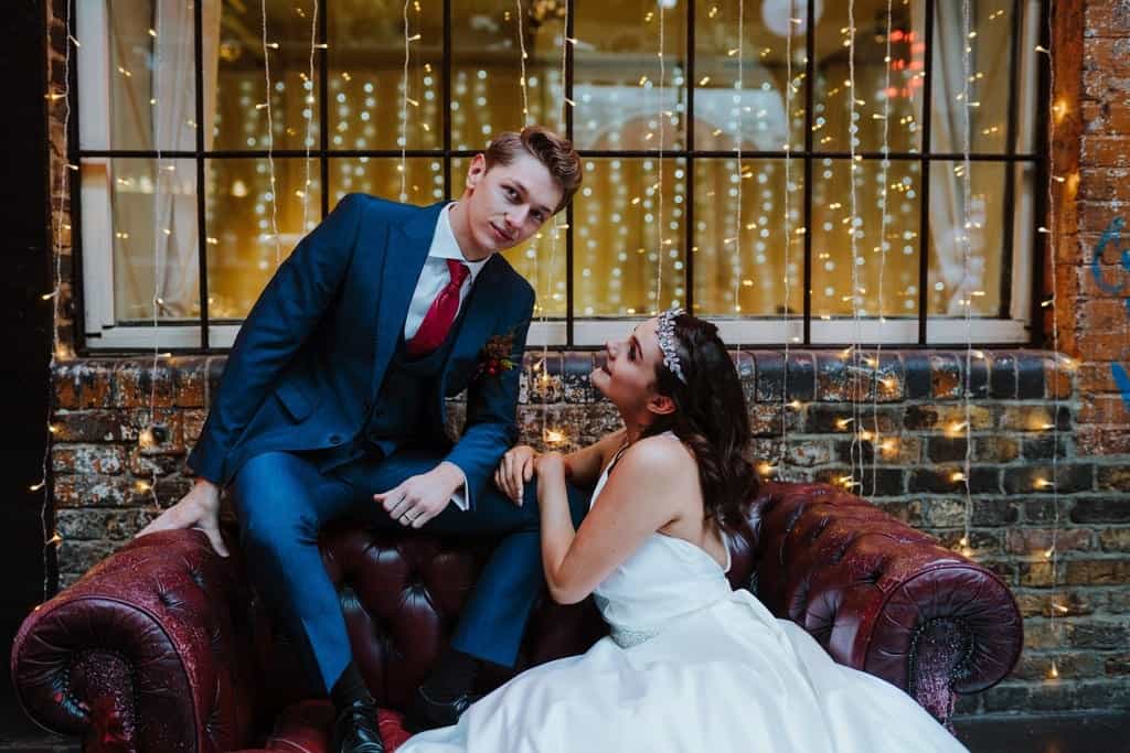 couple on the sofa at islington metal works