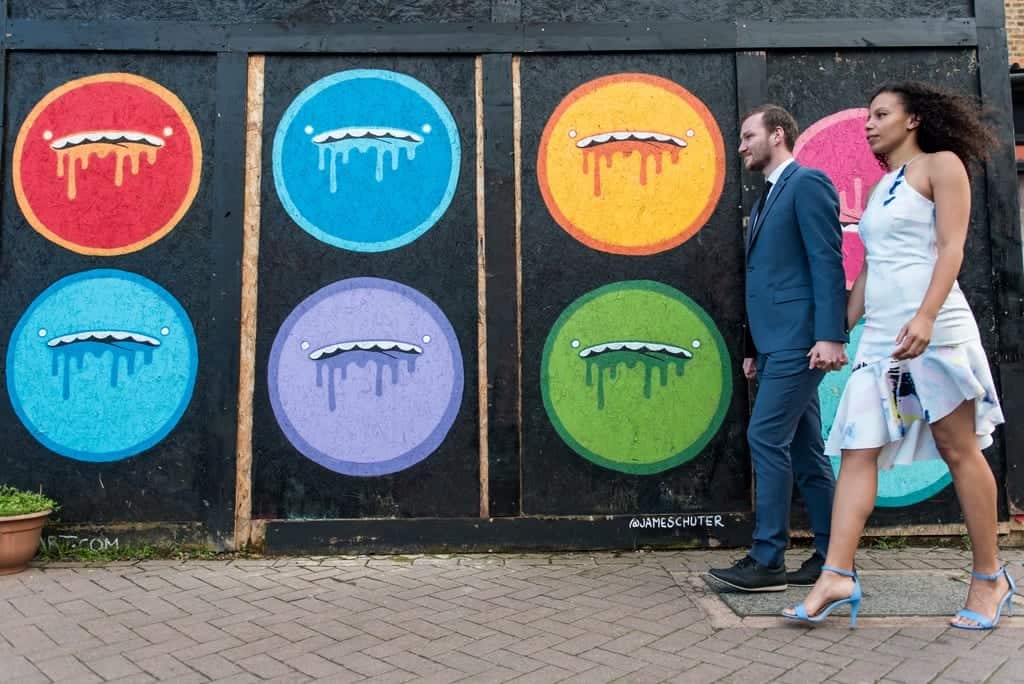 wedding shoot with a graffiti container