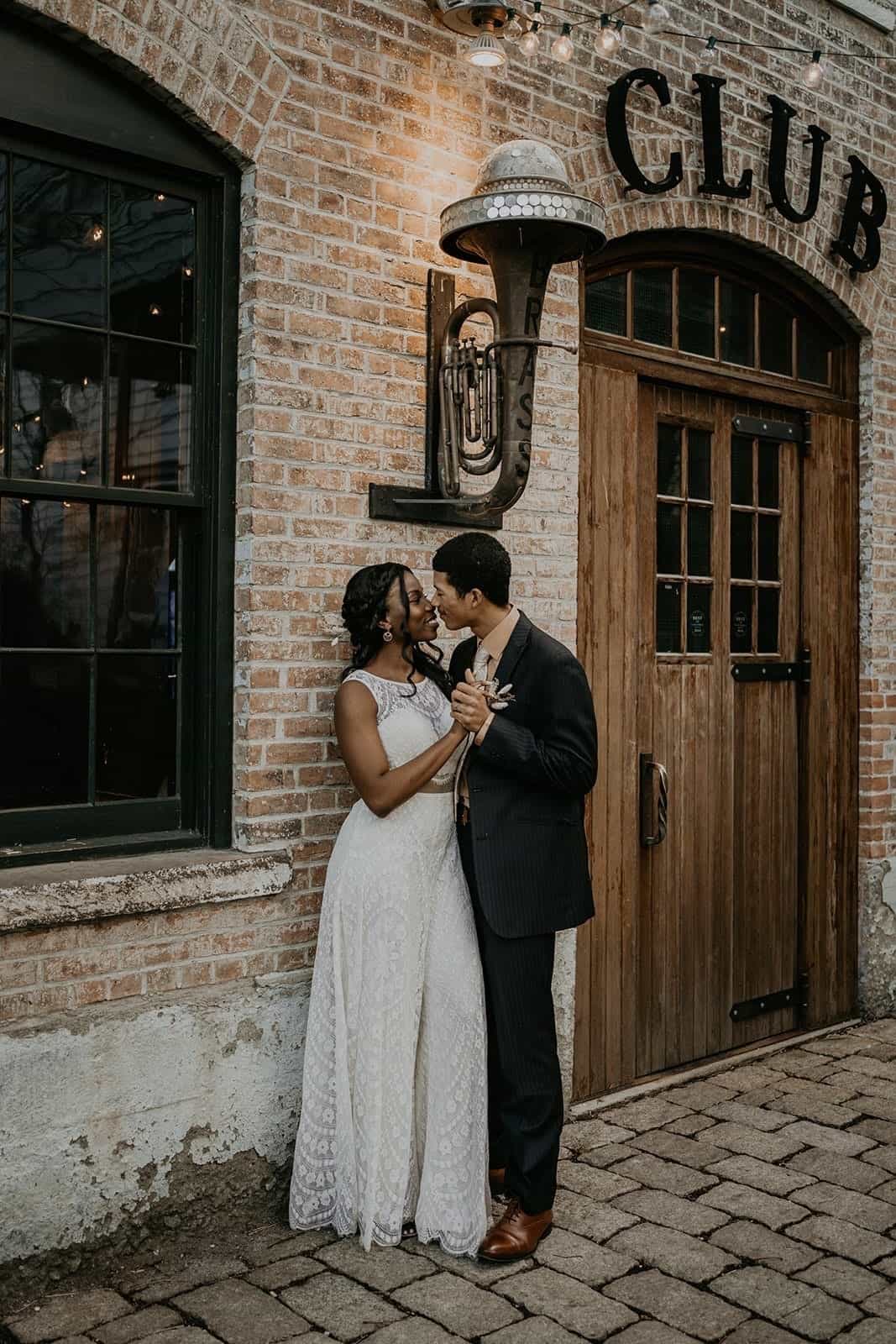 boho couple in a door way