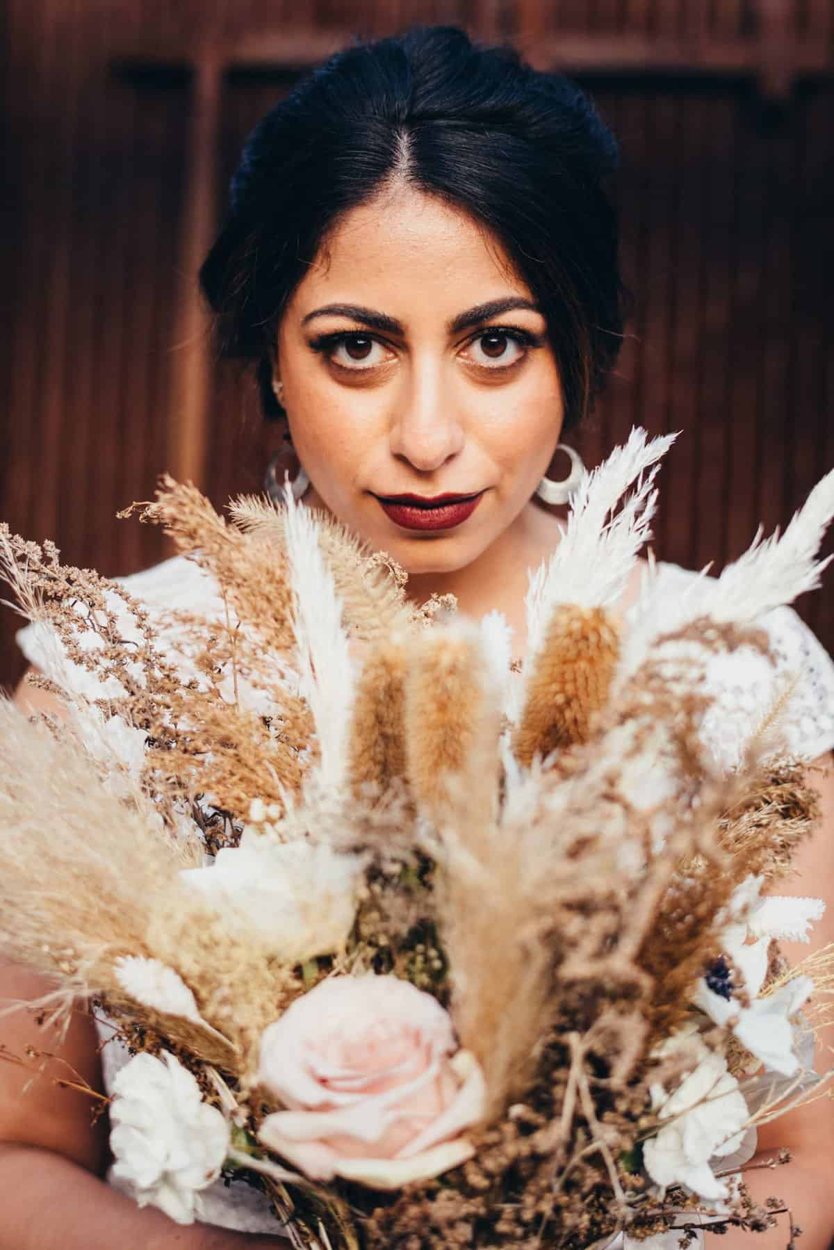 bride and a boho bouquet