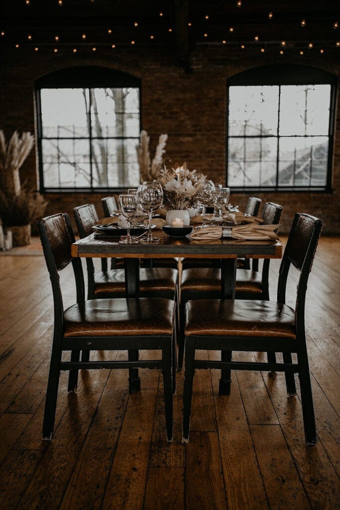 industrial wedding table set uo-p in the perfect winter wedding venue
