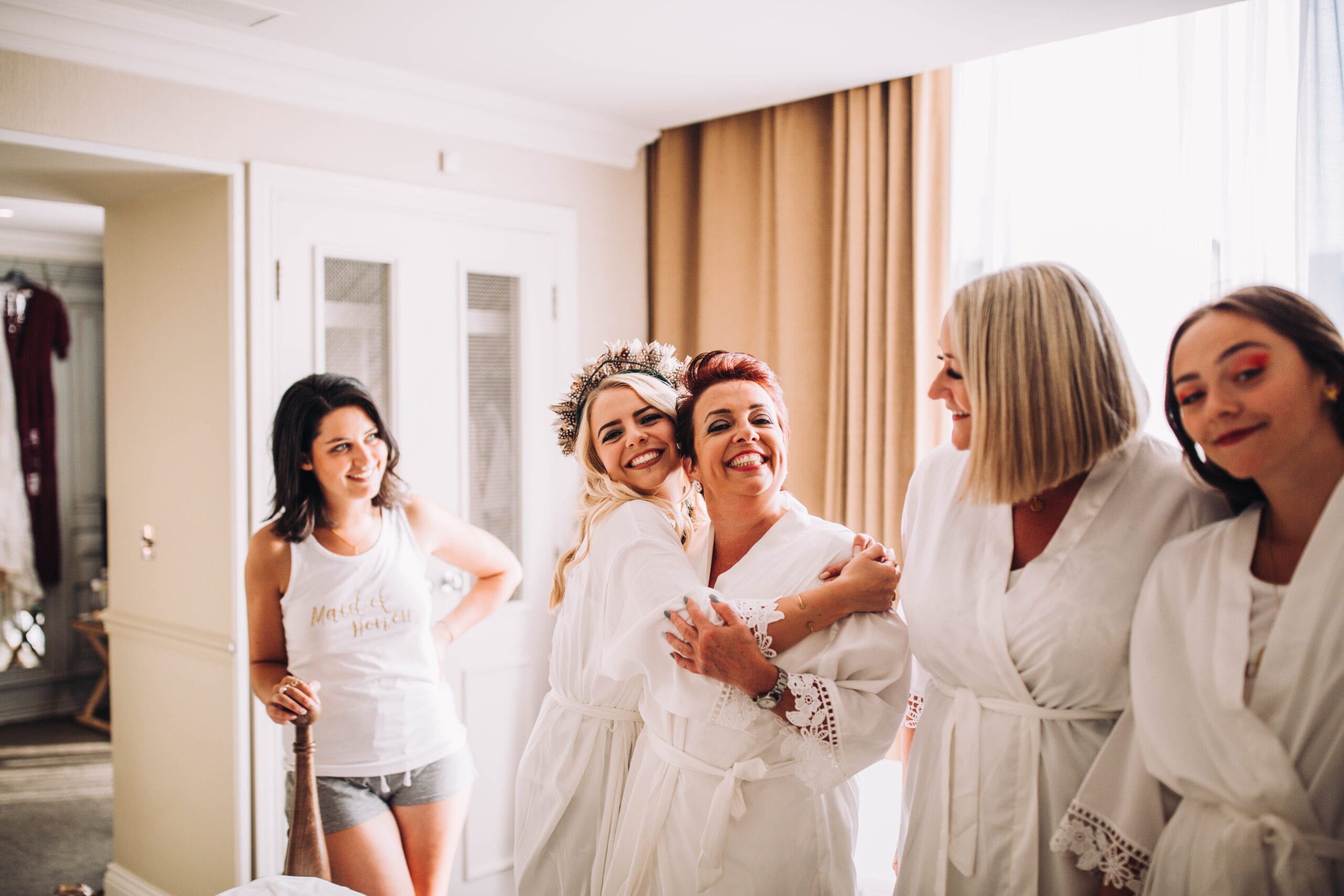 mother of the bride with bride and bridesmaids