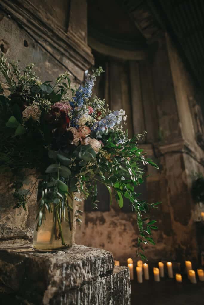 fall wedding in an industrial church candle ceremony set up