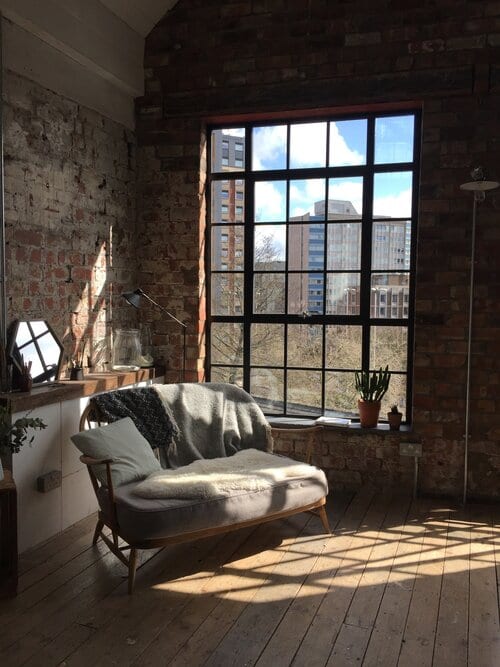 sofa and window view of the forge wedding venue