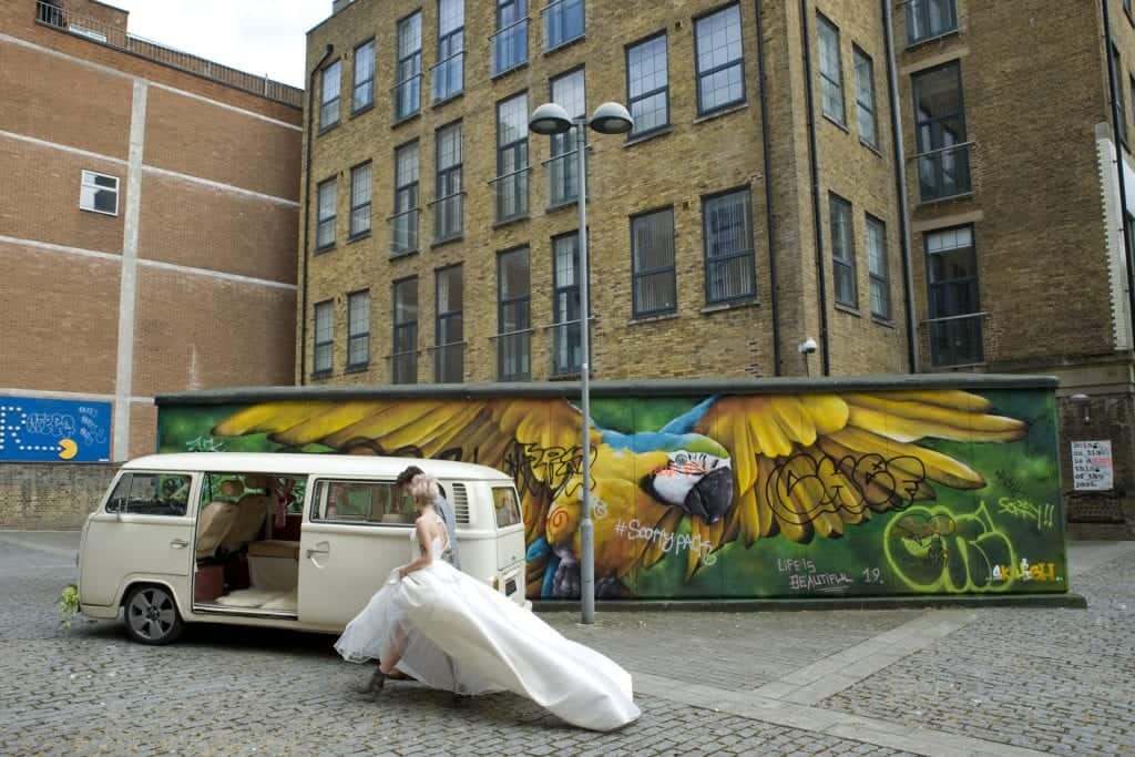 wedding couple with the campervan