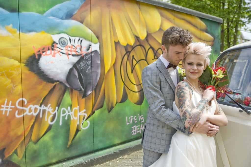 wedding couple and street art