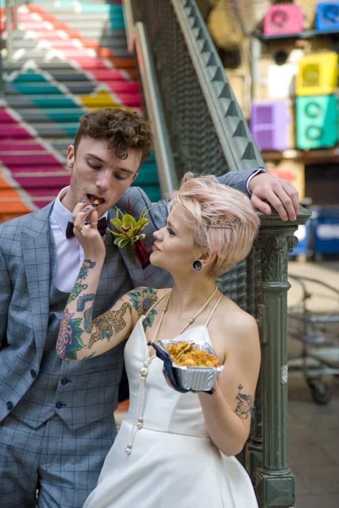 wedding couple eating street food