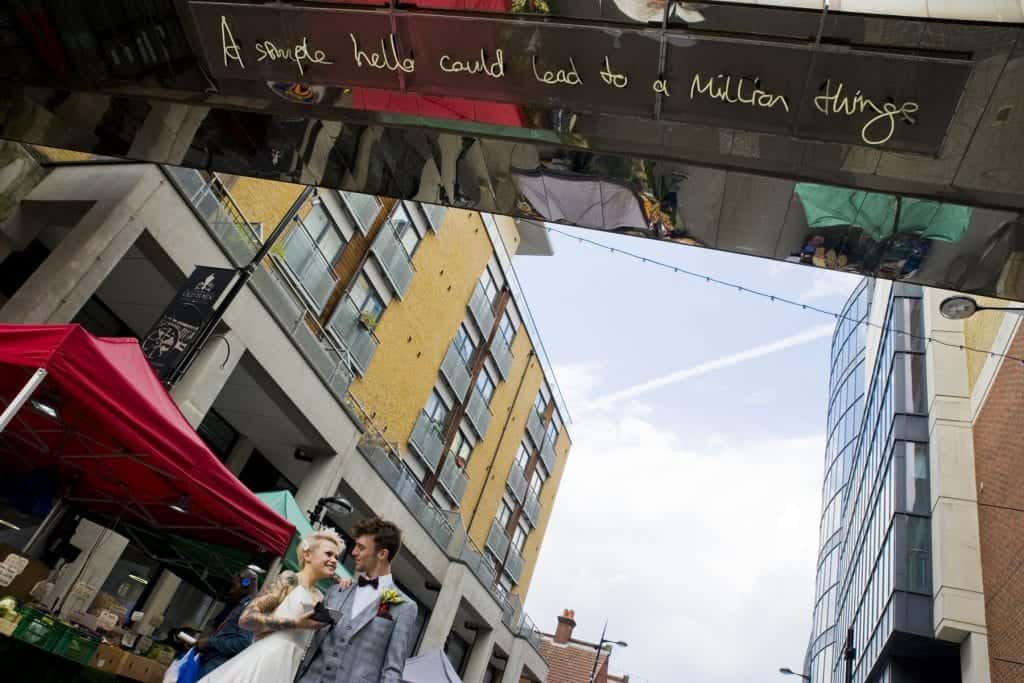 wedding couple on a market street