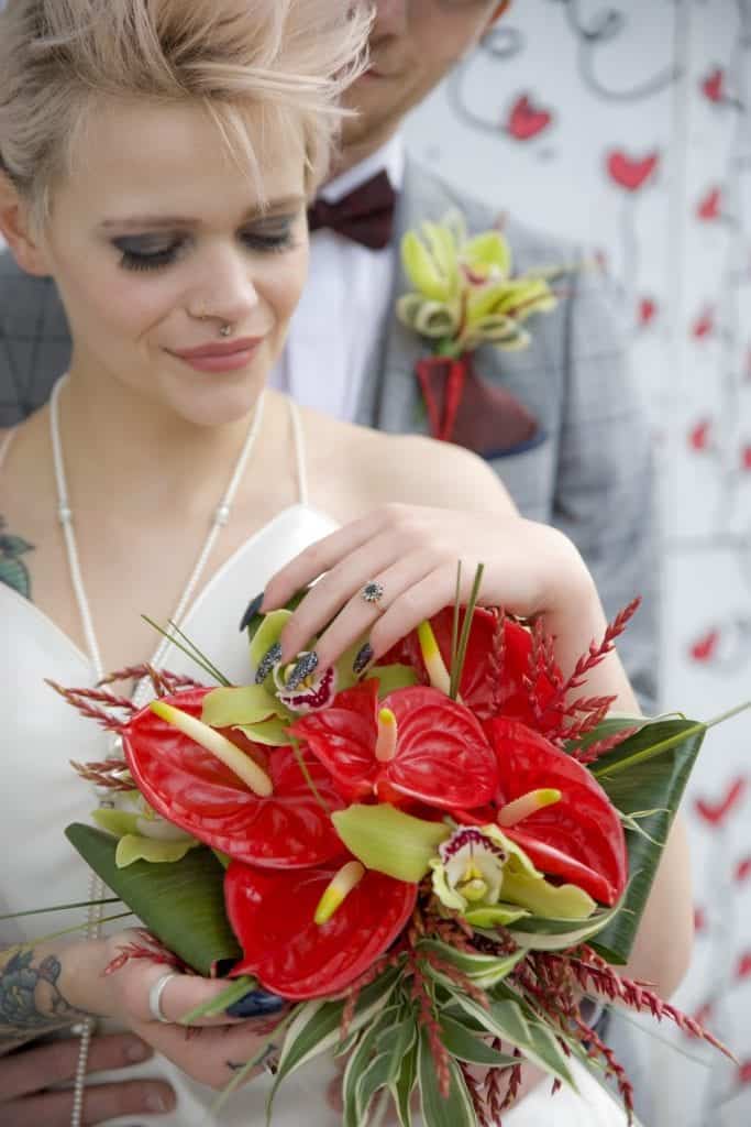 bride and her colourful wedding bouquet
