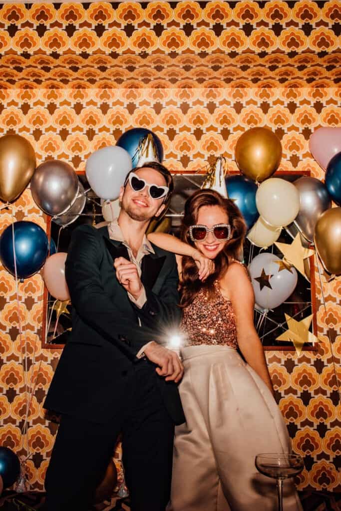 couple in front of photo booth