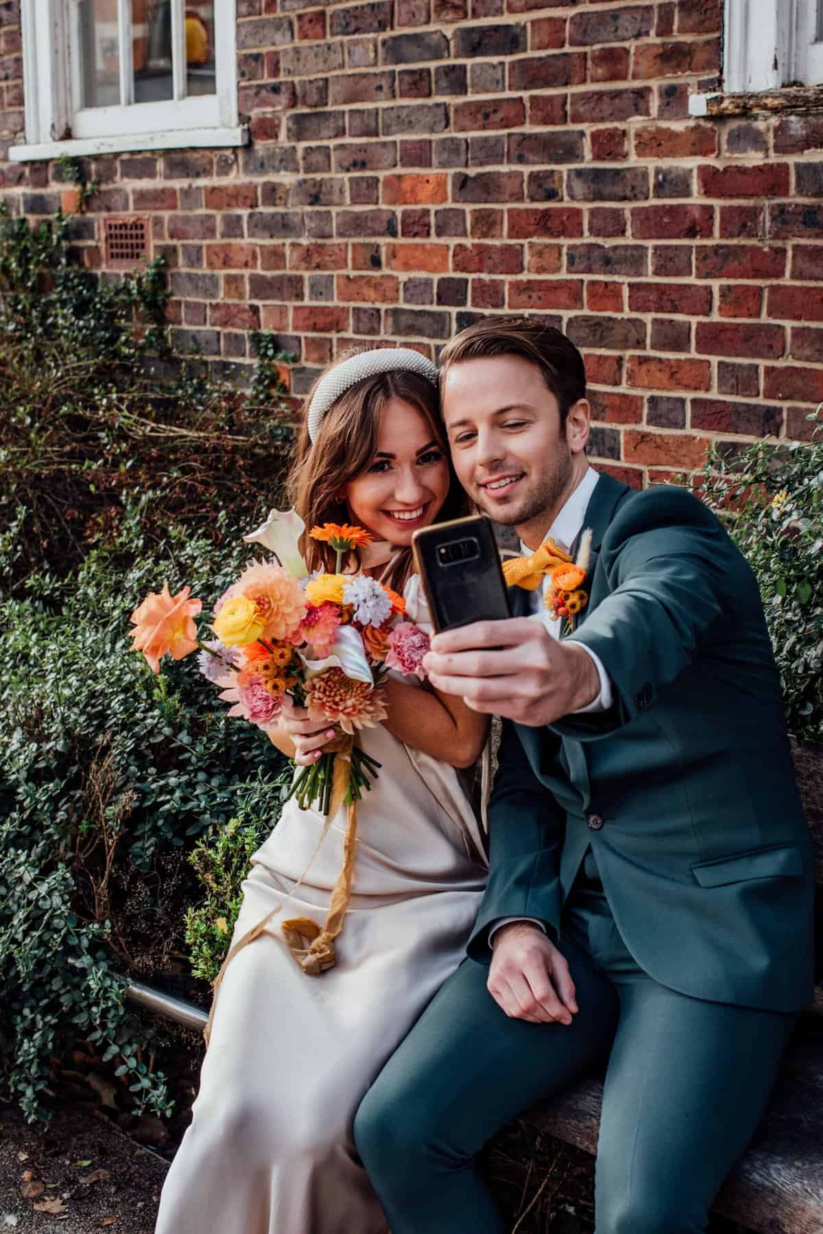 urban disco wedding couple doing a selfie