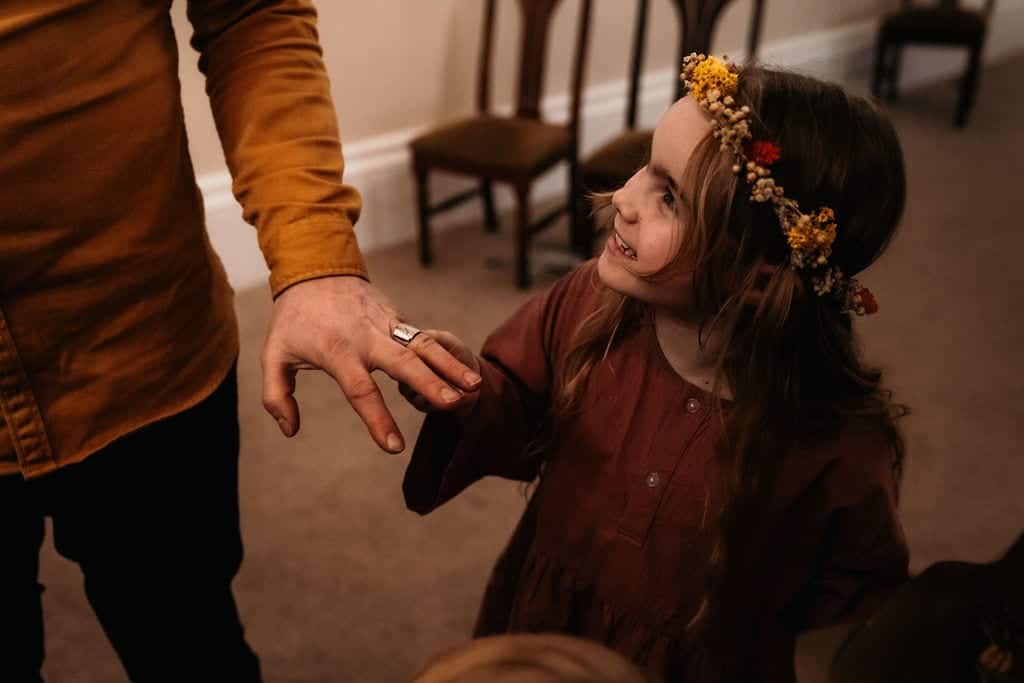 showing off the wedding ring