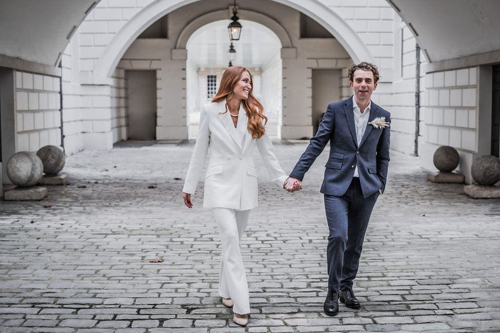 wedding couple walking cobbled streets