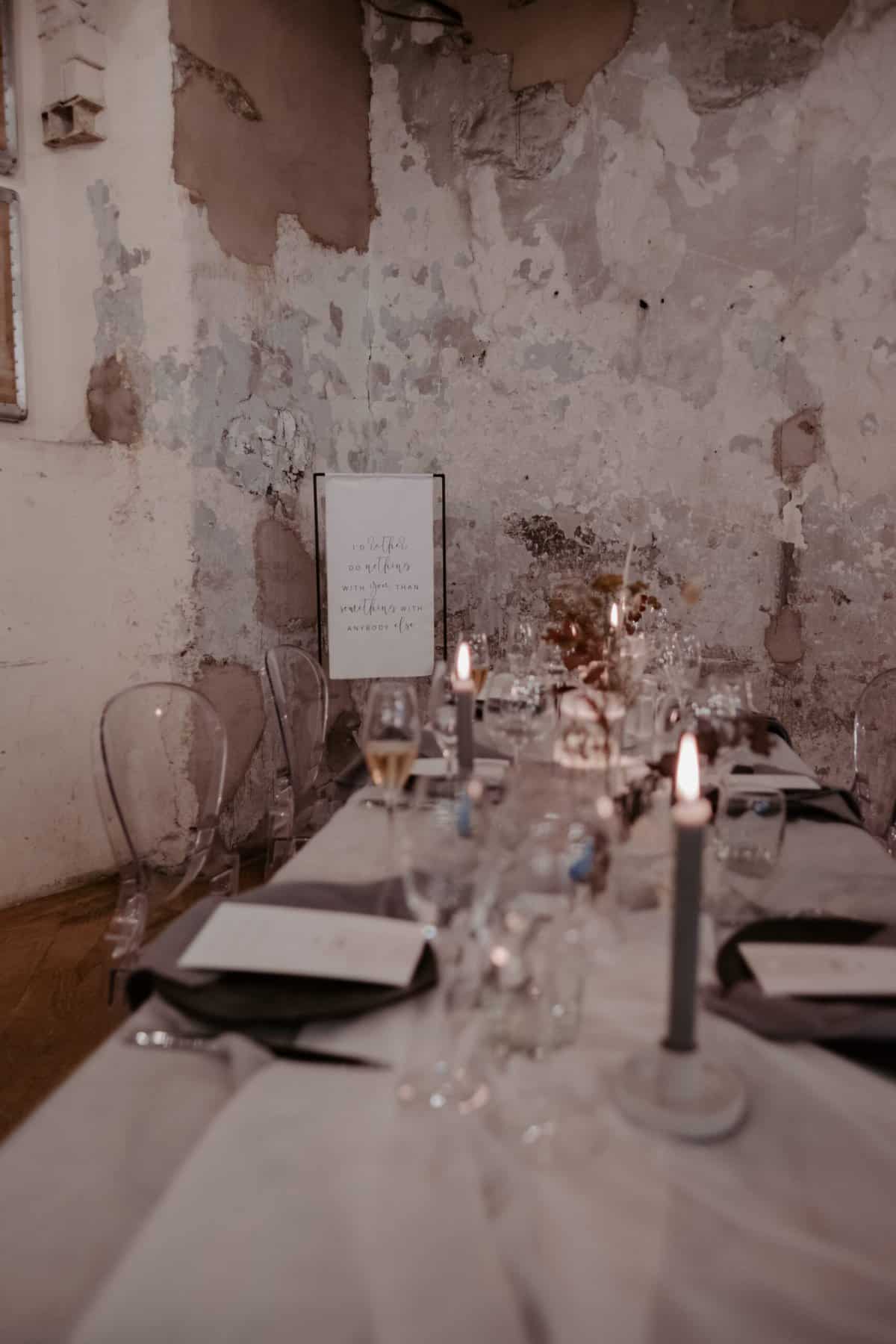 table setting infront of texture industrial walls