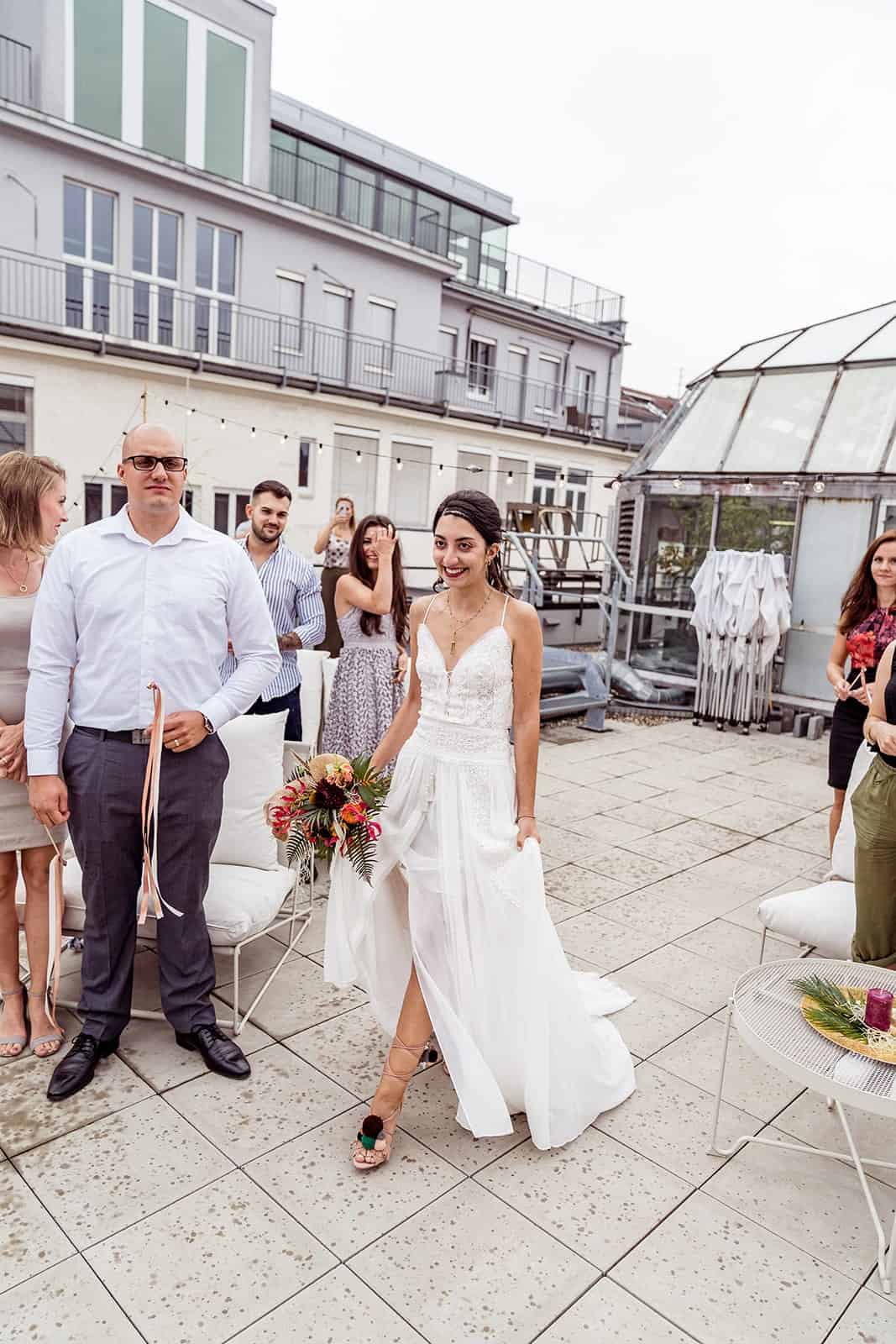 bride walking down ceremony aisle 