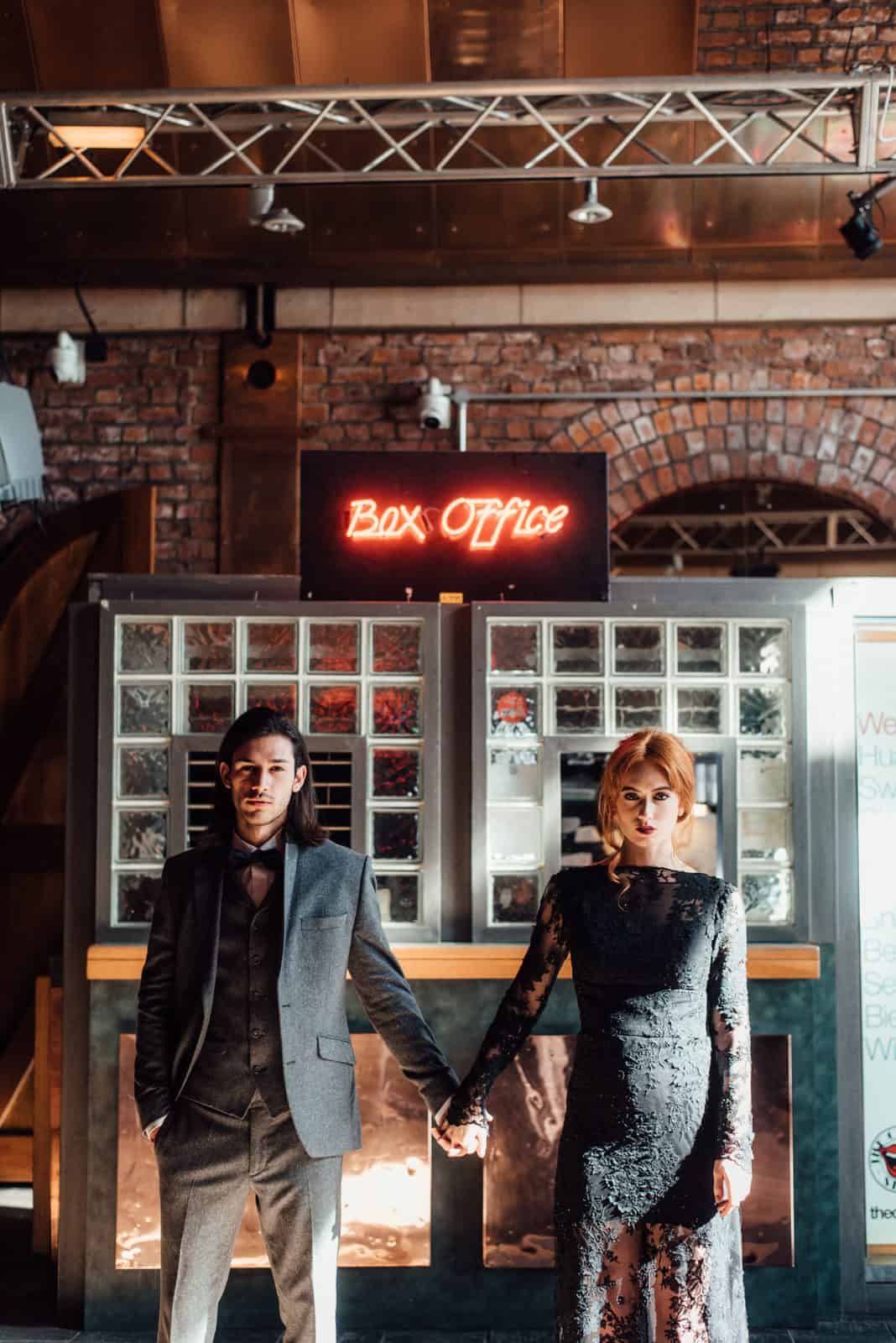 bride in black gothic dress with groom