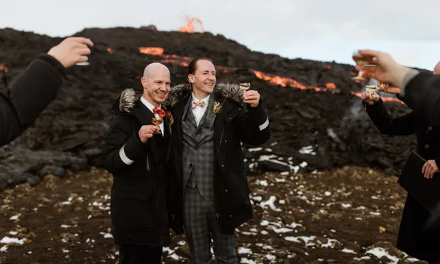 couple getting married under volcano