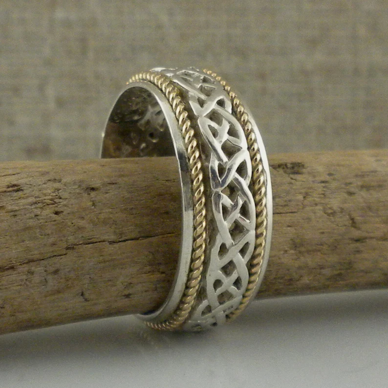 silver and gold knot celtic weddiing ring