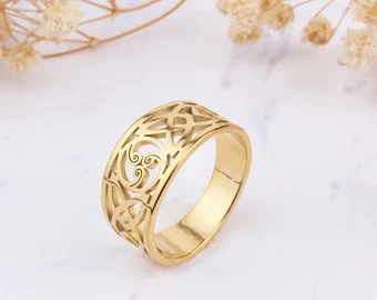 gold celtic triskele wedding ring 