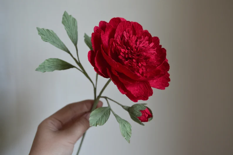 red crepe paper rose