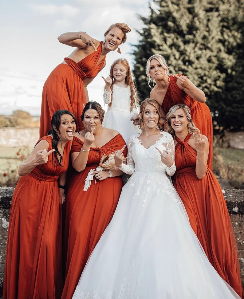bridemaid wearing multi-way dresses with bride
