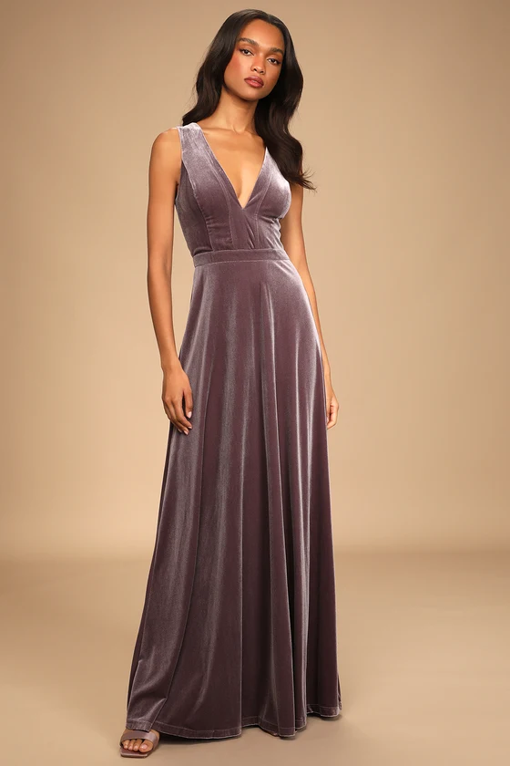 a velvet dusky purple dress with a plunge neckline
