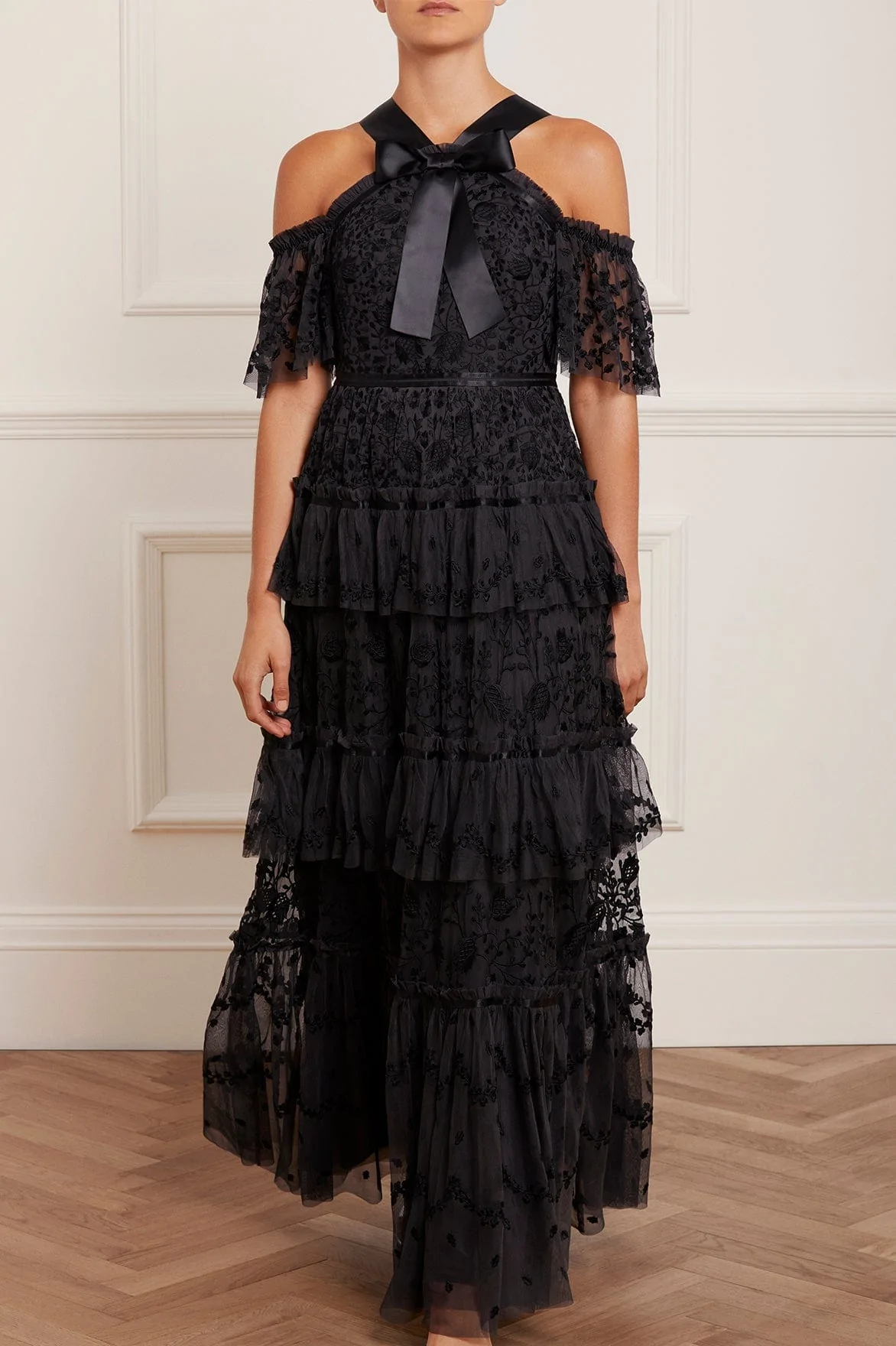 halterneck black dress with lace ruffled skirt 