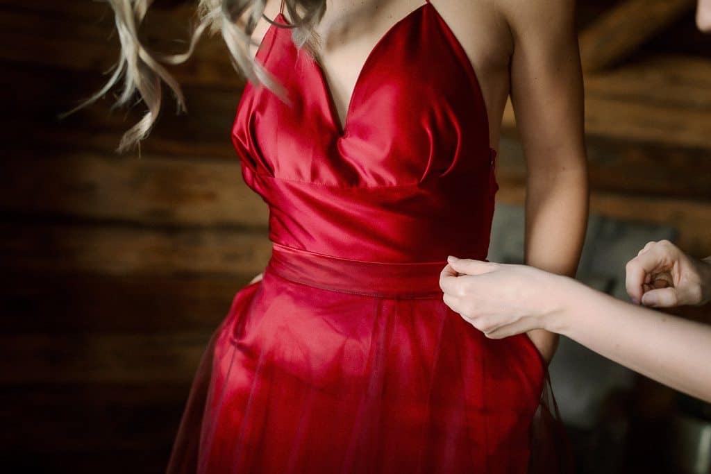 red wedding dress with detachable sleeves taken off