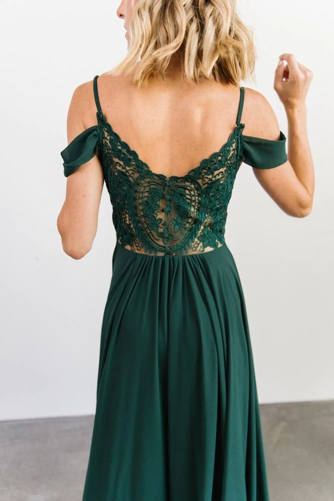 back view of emerald dress with lace panel