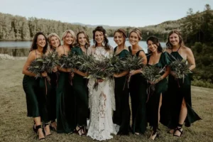 bride and bridesmaids in forest green bridesmaid dresses