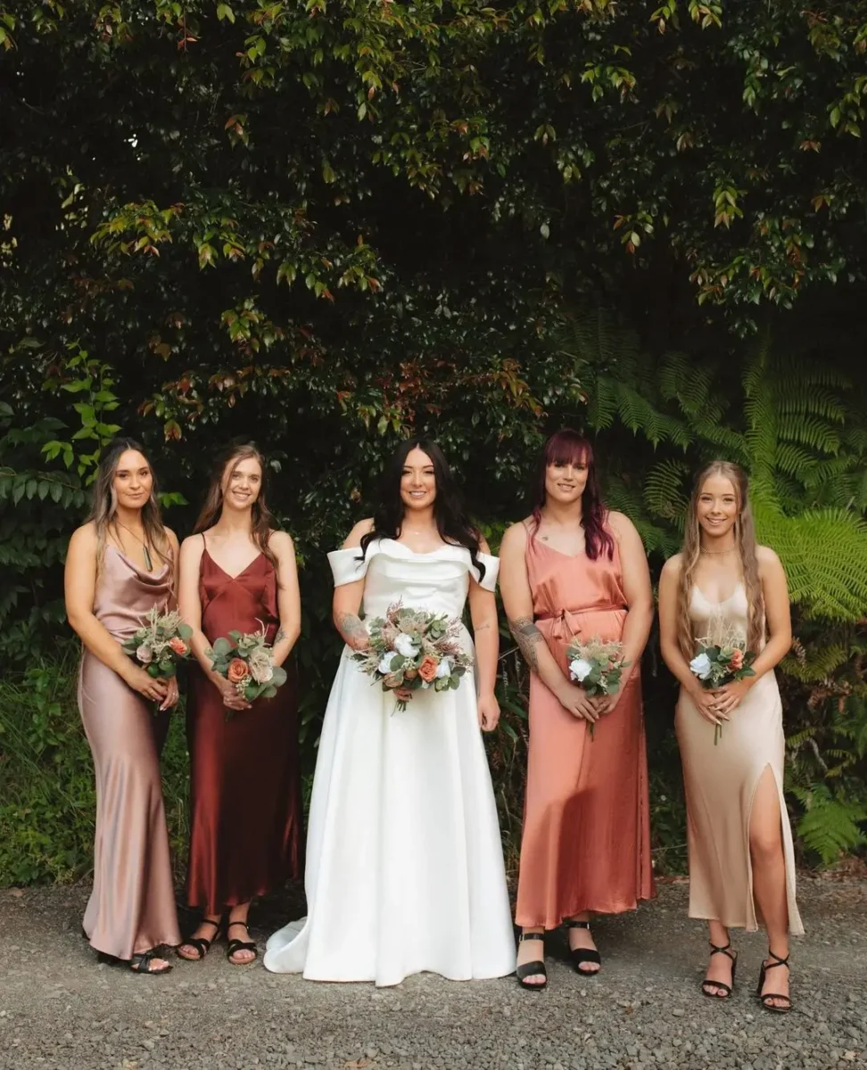 bridesmaid in brown shades and peach shade dresses