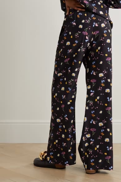 black pants with a floral pattern all over