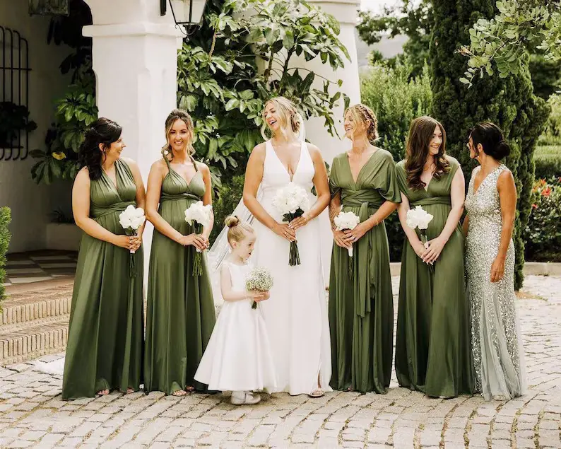 bride with flower girl, mother and 4 bridesmaids in olive multiway dresses