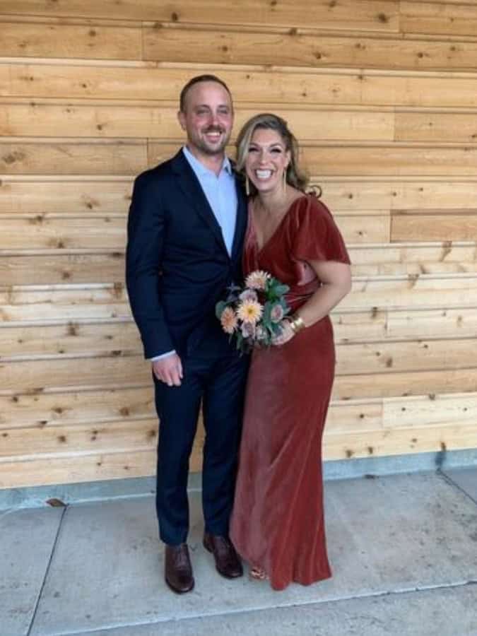 father and mother of the bride - mother in rust velvet dress