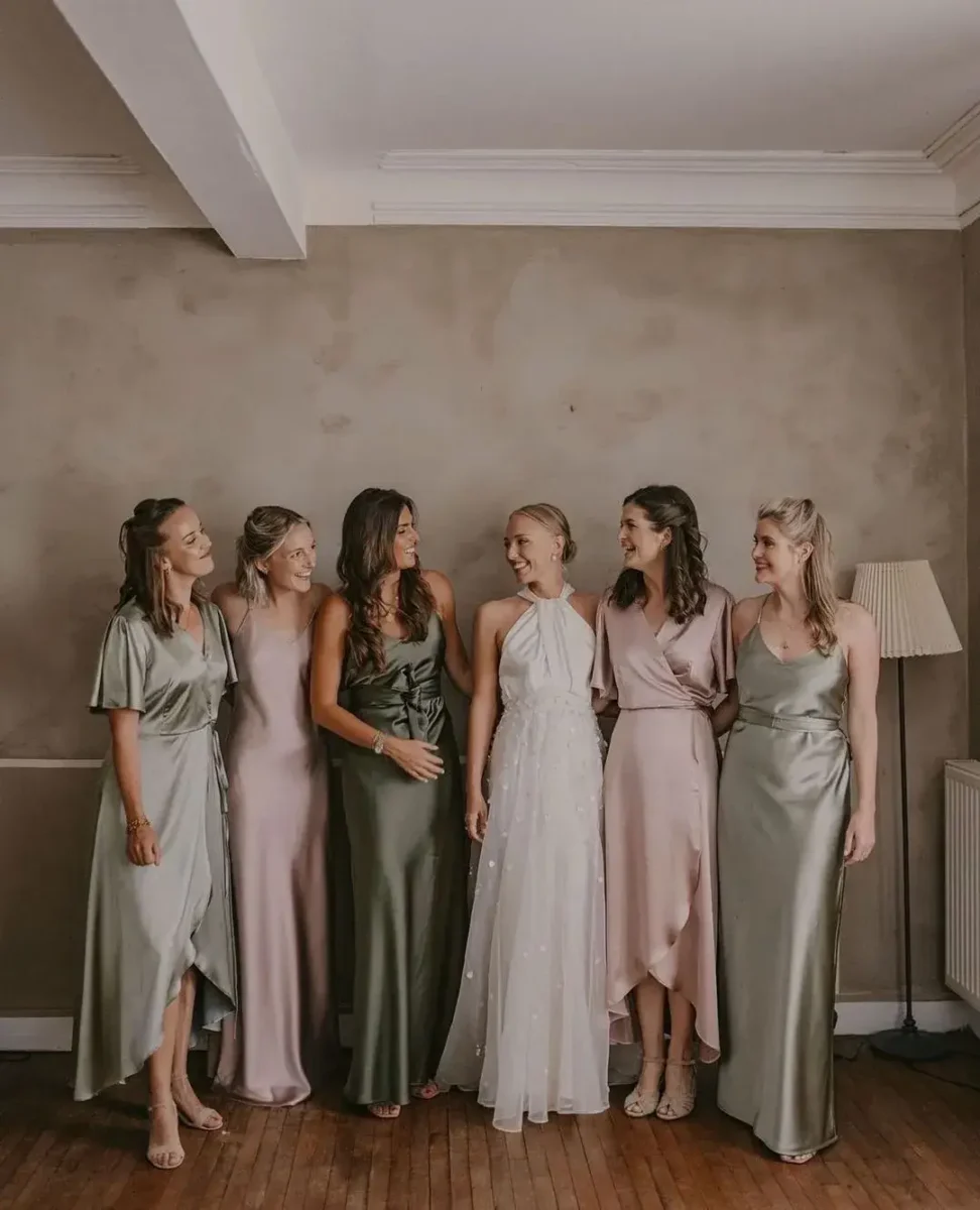 bridesmaid in olive green and soft coloured dresses