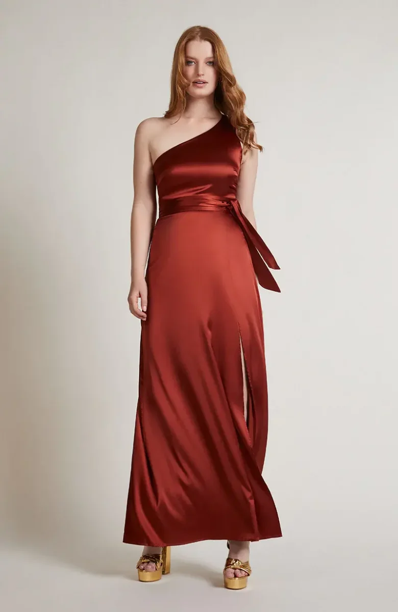 bridesmaid in burnt orange satin one shoulder dress