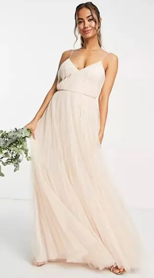 thin strap full chiffon skirt bridesmaid dress in a champagne colour