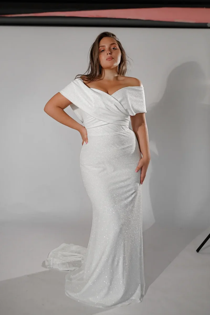 plus size bride in sequin off the shoulder dress 