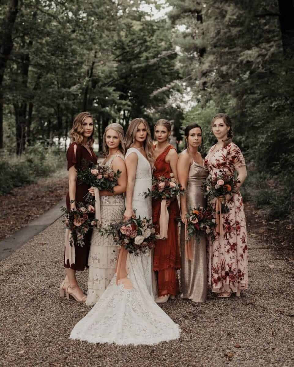 floral mismatched bridesmaid dresses for autumn - real bridesmaids in wood setting 