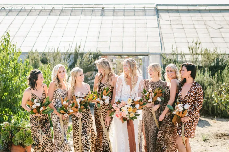 bride with bridesmaid in leopard print dresses