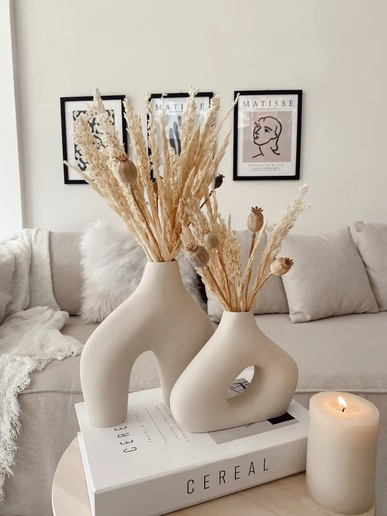 cream curved shaped vases
