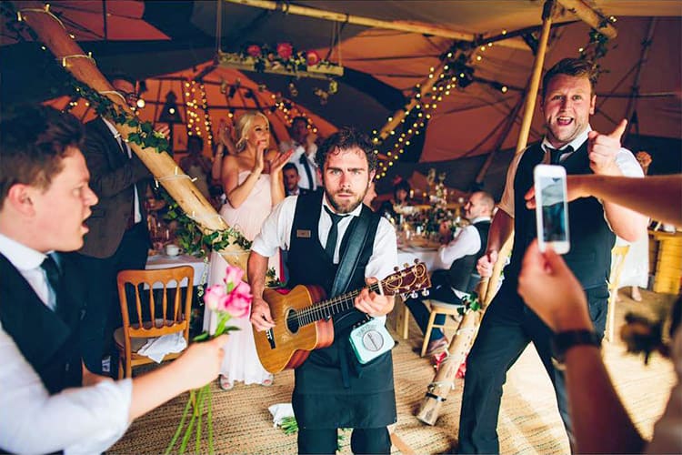 singing waiters at a wedding