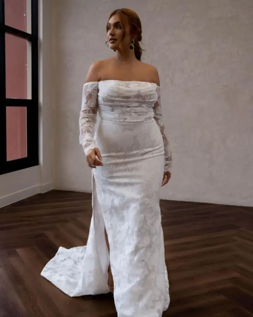 bride in white floral printed wedding dress, long sleeve