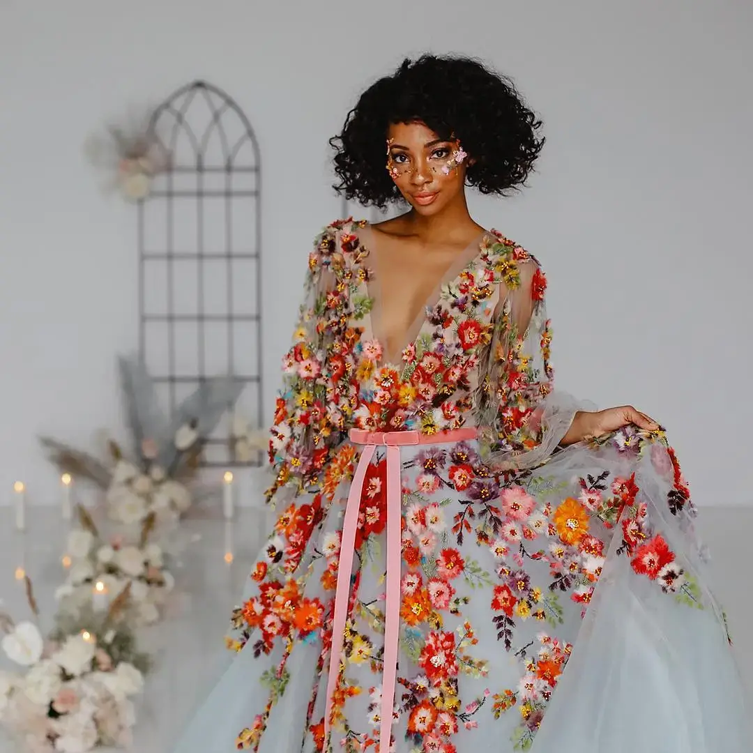 bride in bold embelished floral dress