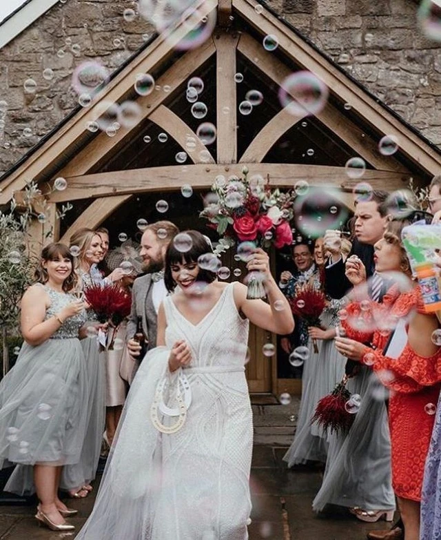 bride surrounded by bubbles