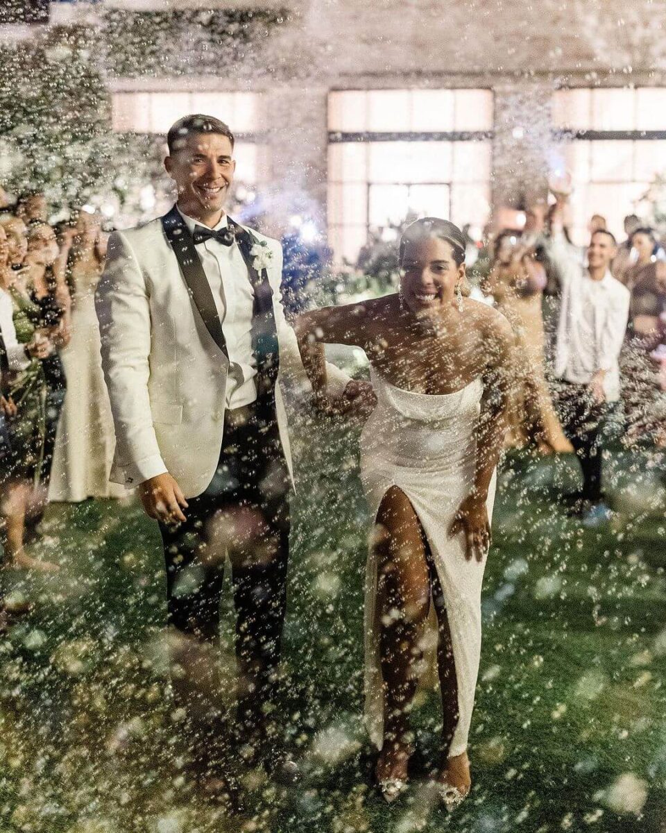 just married couple surrounded by bubbles