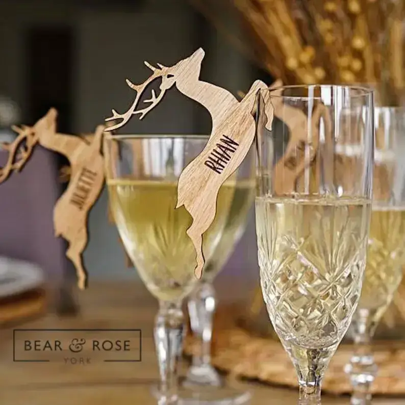 wooden reindeer place setting that can hang on a glass